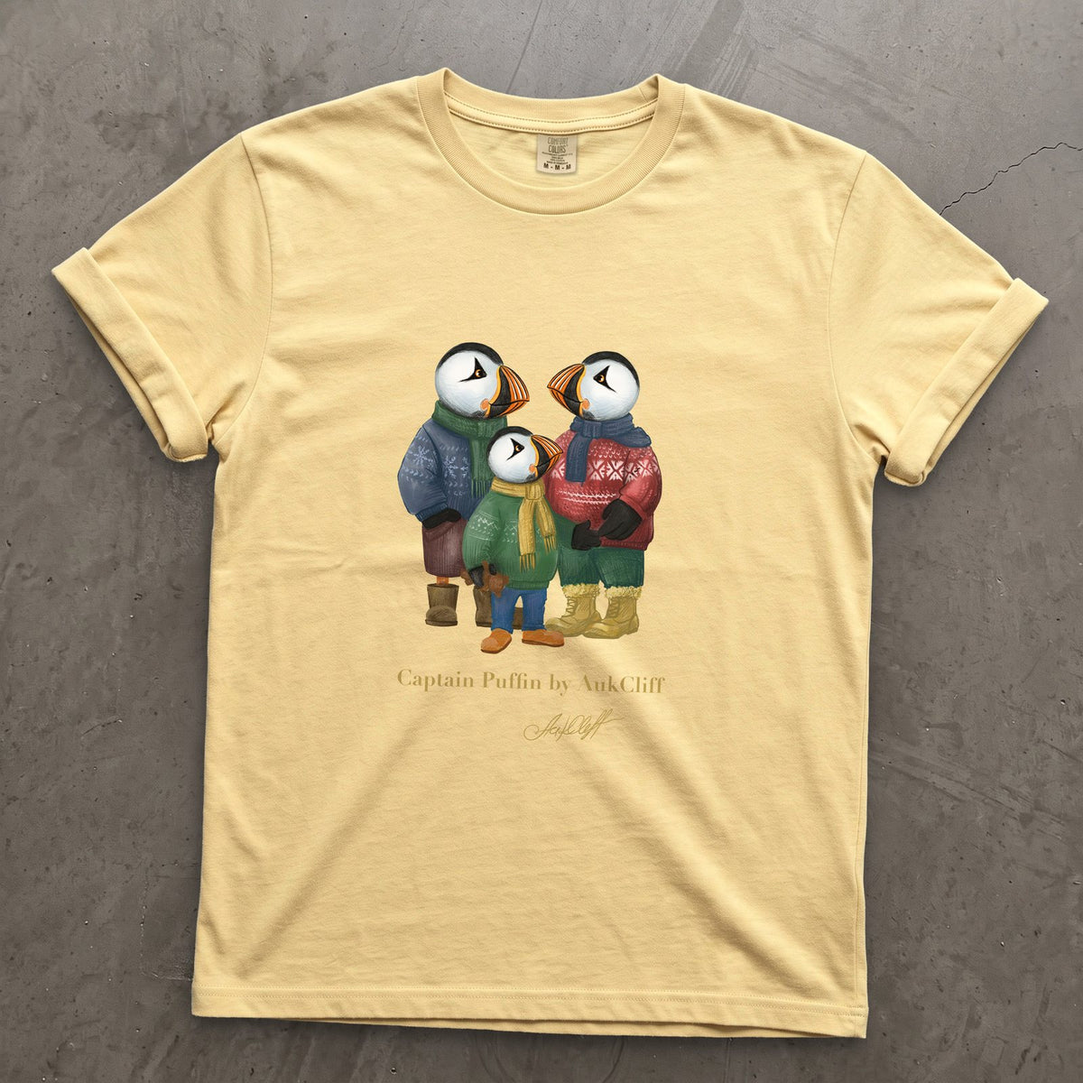 Captain Puffin Festive Family on a Butter Comfort Colors t-shirt