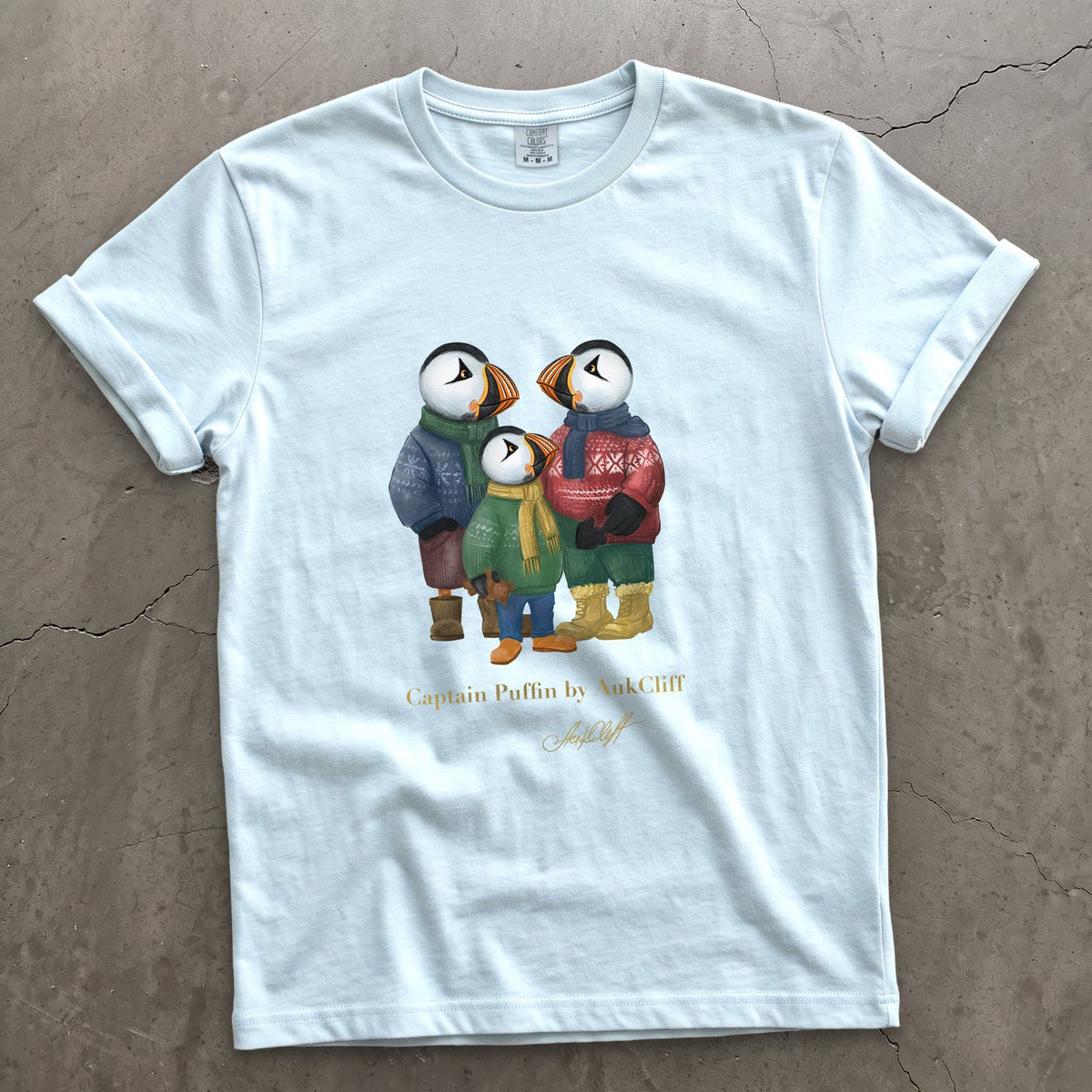 Captain Puffin Festive Family on a Chambray Comfort Colors t-shirt