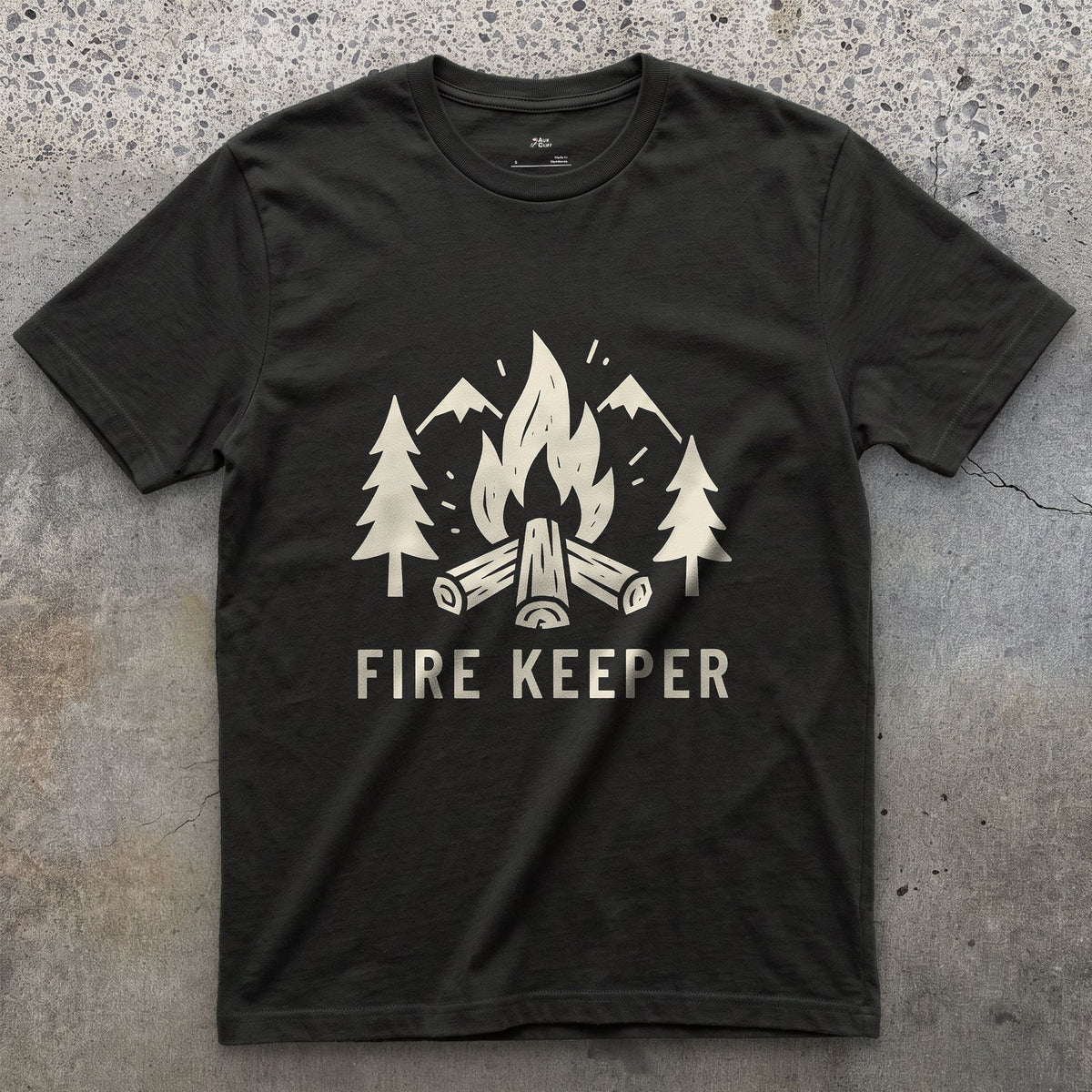 The Fire Keeper, Mountains and Firewood design on a Black Gildan Softstyle t-shirt