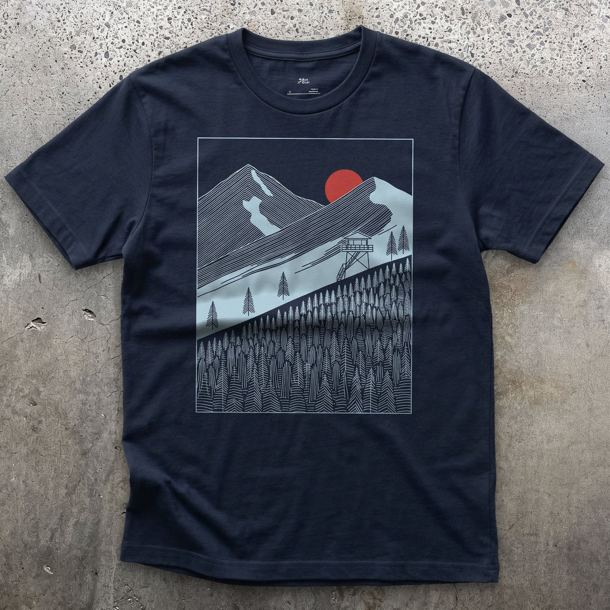 Watching the Mountain Treeline From the Tower design on a Navy Gildan Softstyle t-shirt