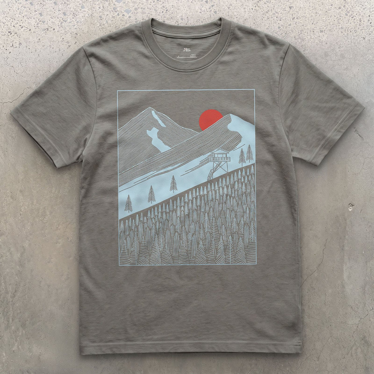 Watching the Mountain Treeline From the Tower design on a Charcoal Gildan Softstyle t-shirt