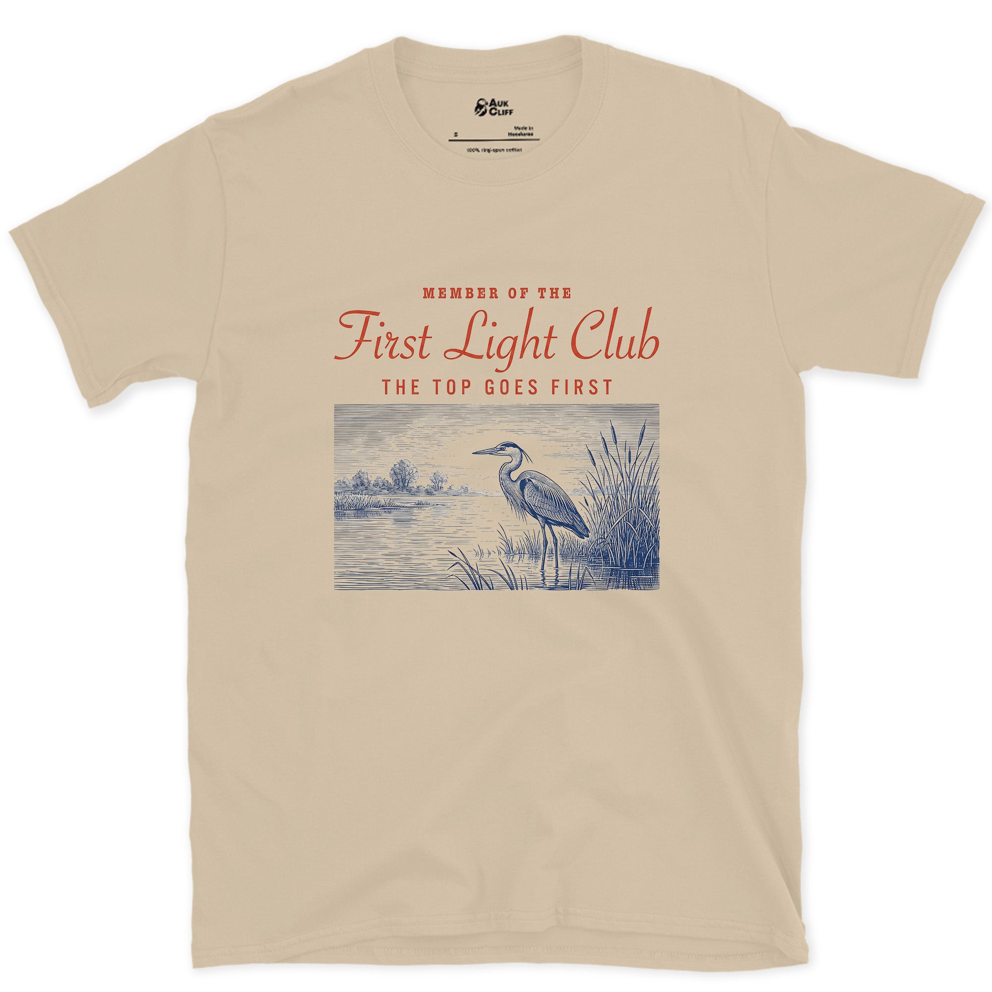 The Top Goes First, Heron in Water design on a Sand Gildan Softstyle t-shirt