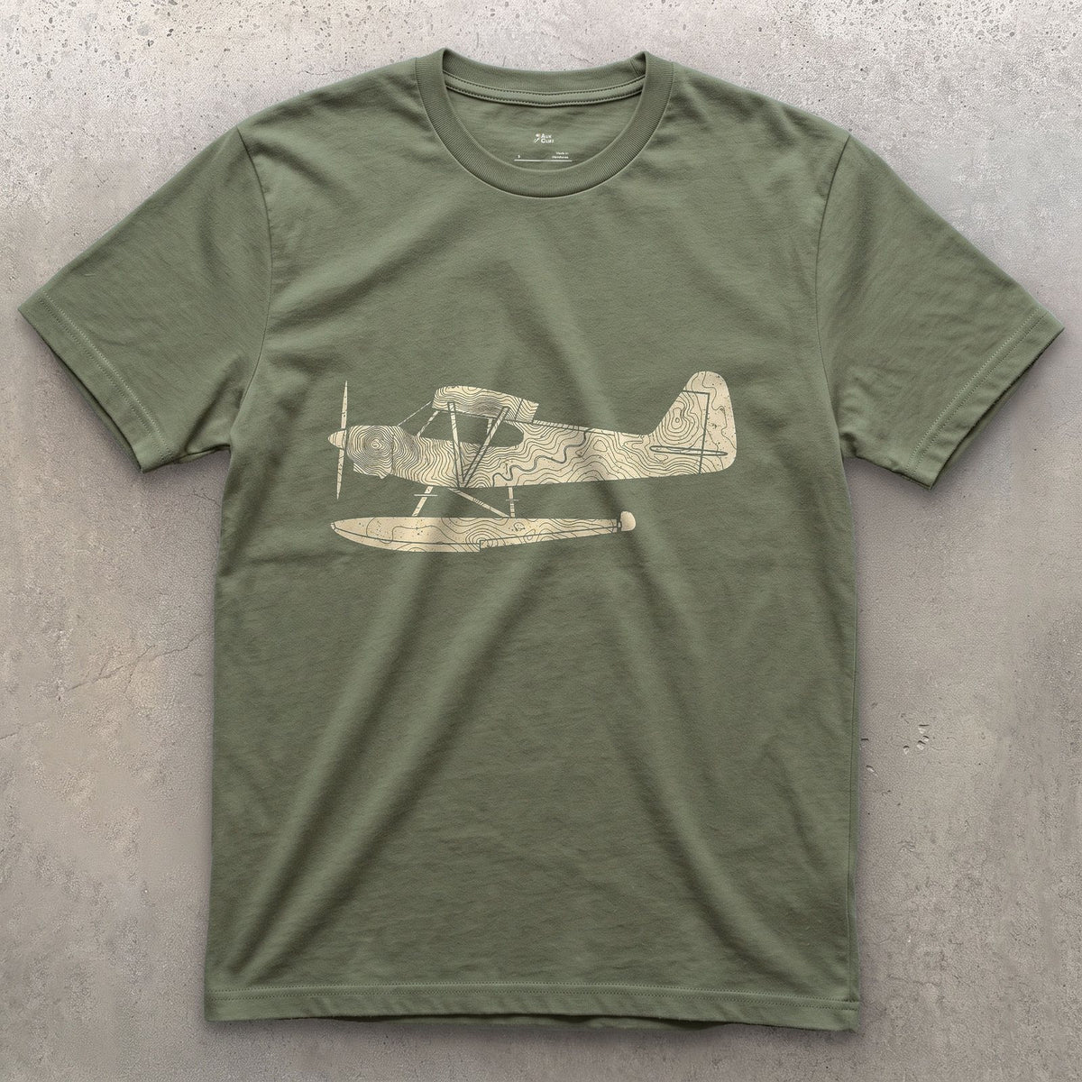 Float Plane in Contours design on a Military Green Gildan Softstyle t-shirt