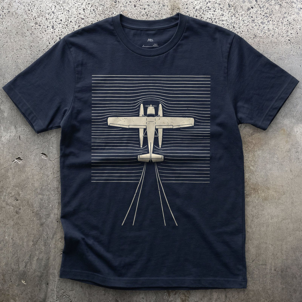 Float Plane of Ripples design on a Navy Gildan Softstyle t-shirt