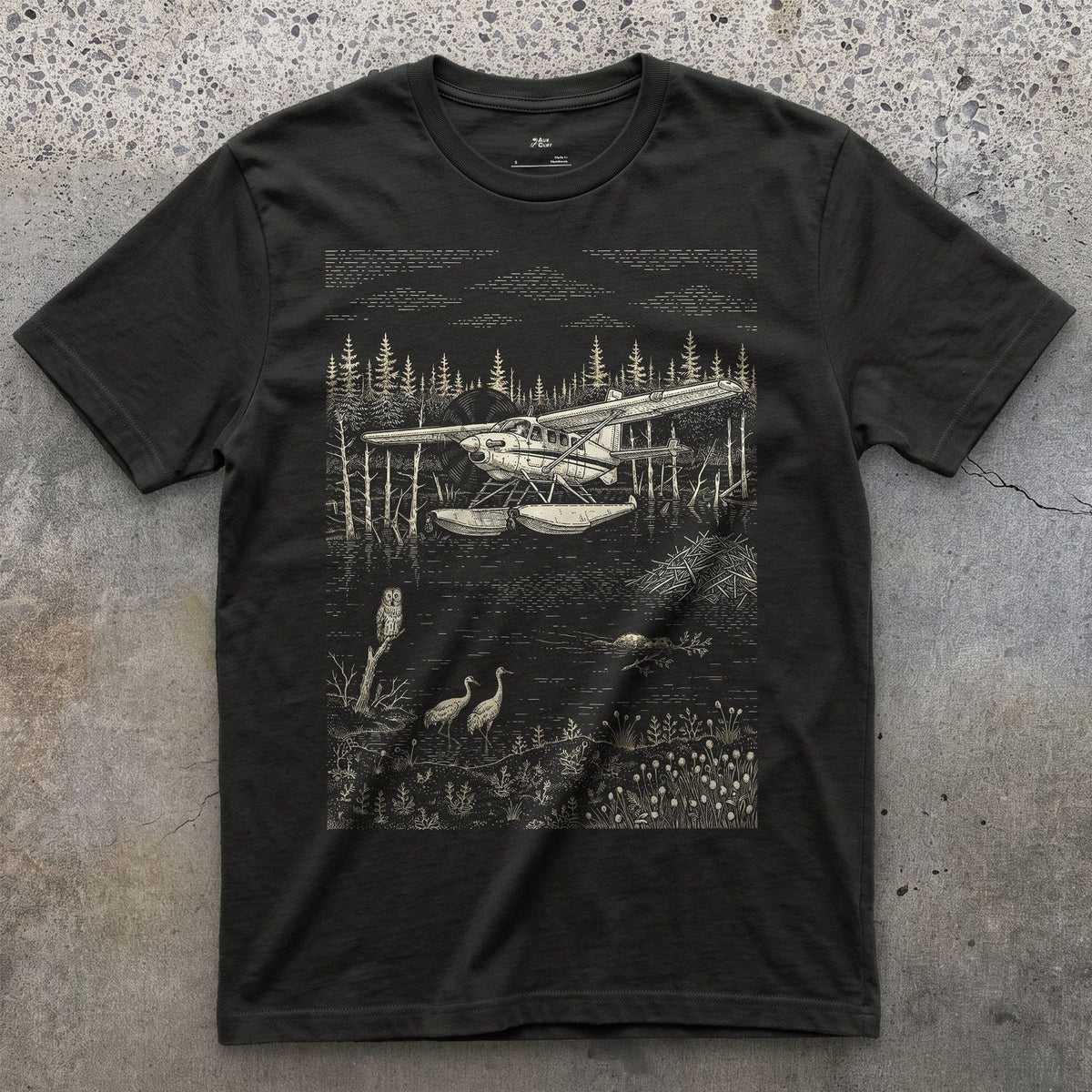 Float Plane on the Muskeg design on a Black Gildan Softstyle t-shirt