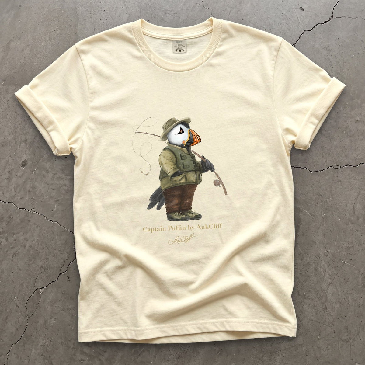 Captain Puffin Fly Fisherman on a Ivory Comfort Colors t-shirt