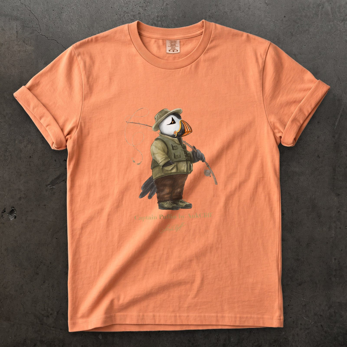 Captain Puffin Fly Fisherman on a Terracotta Comfort Colors t-shirt