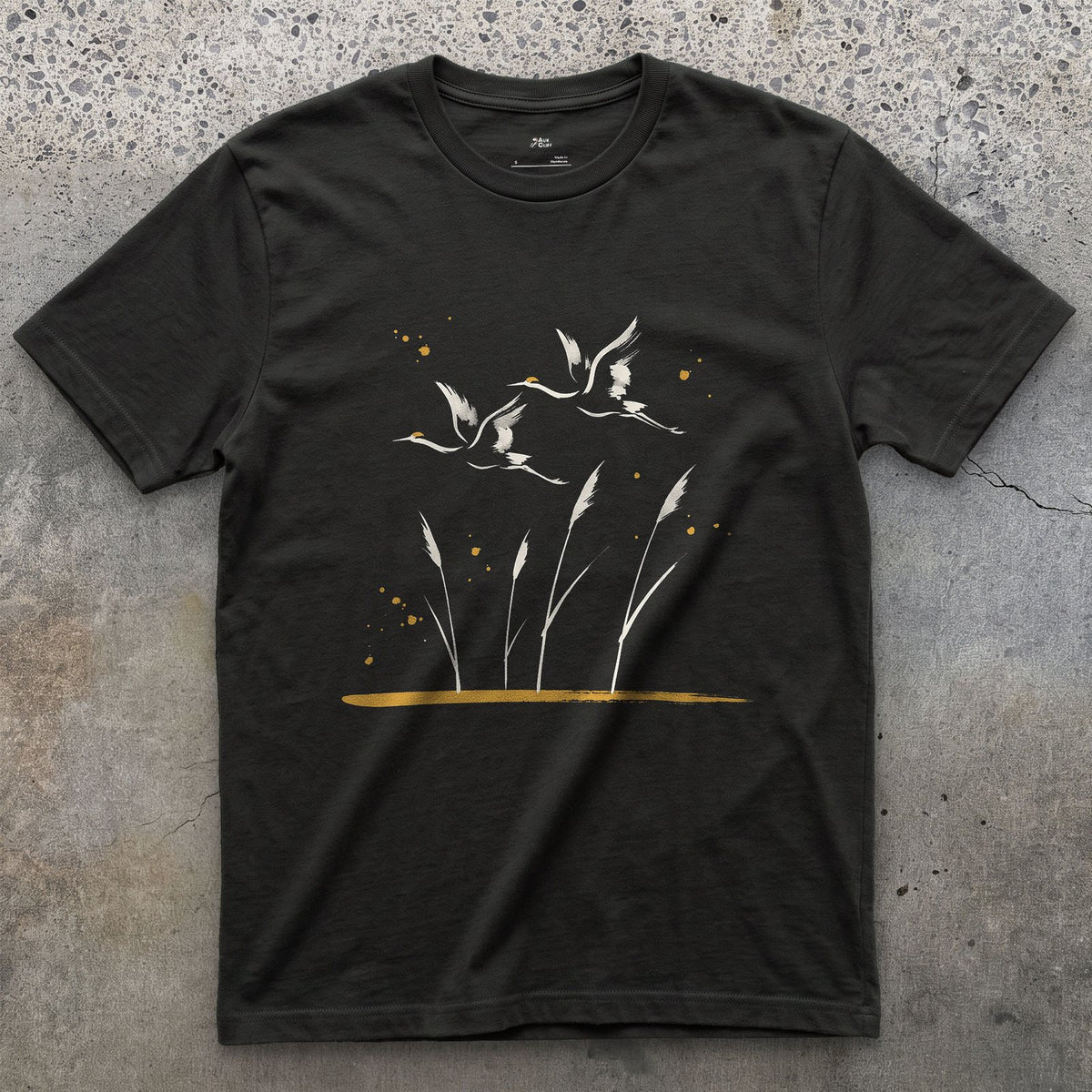 Flying Cranes and Reeds design on a Black Gildan Softstyle t-shirt