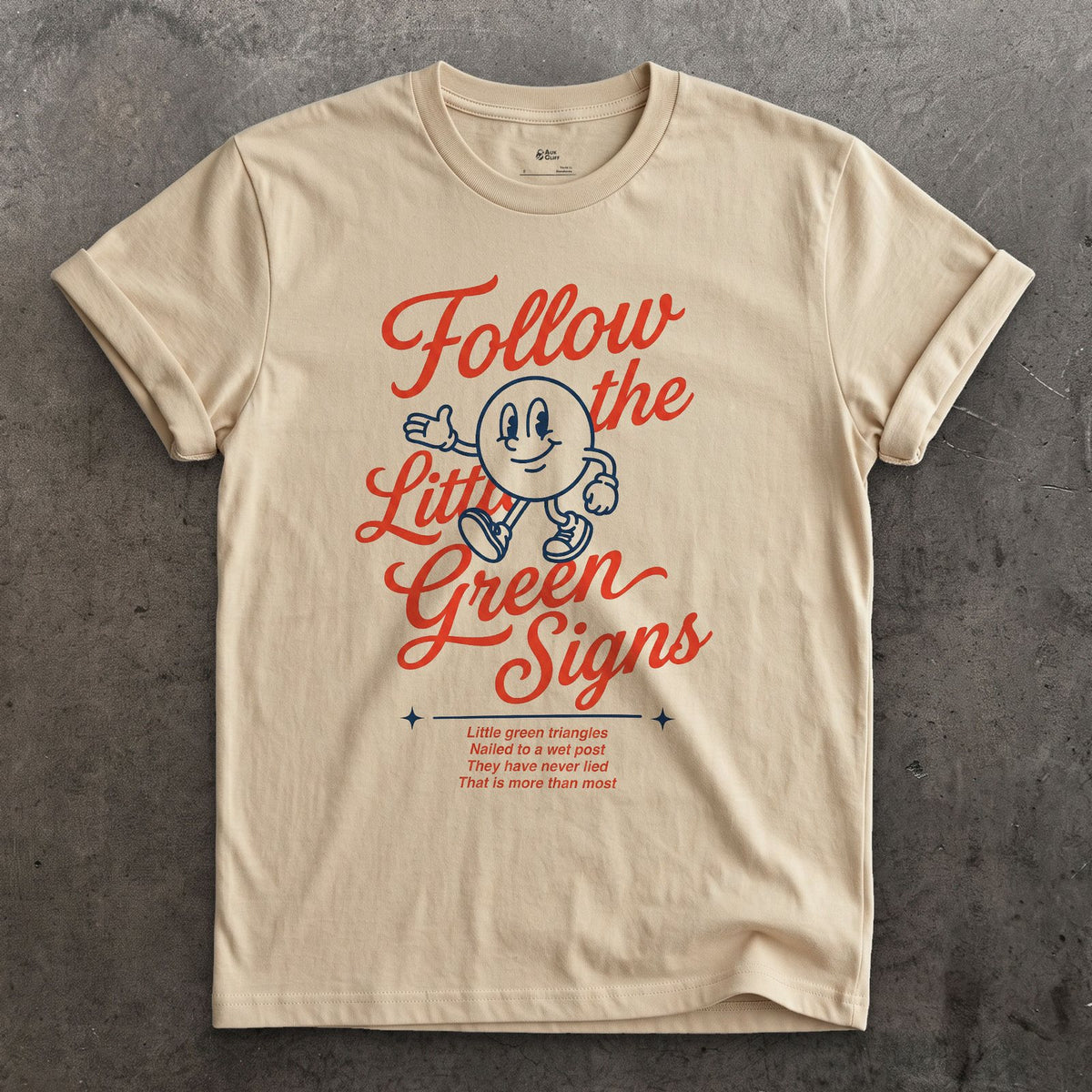 Follow the Little Green Trail Signs design on a Sand Gildan Softstyle t-shirt