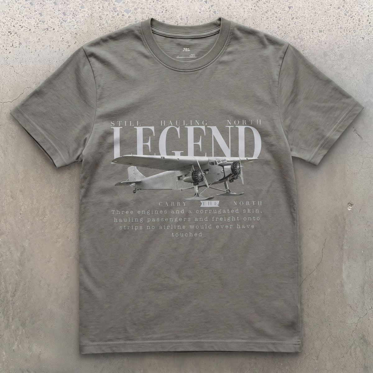 Ford Trimotor on Skis design on a Charcoal Gildan Softstyle t-shirt