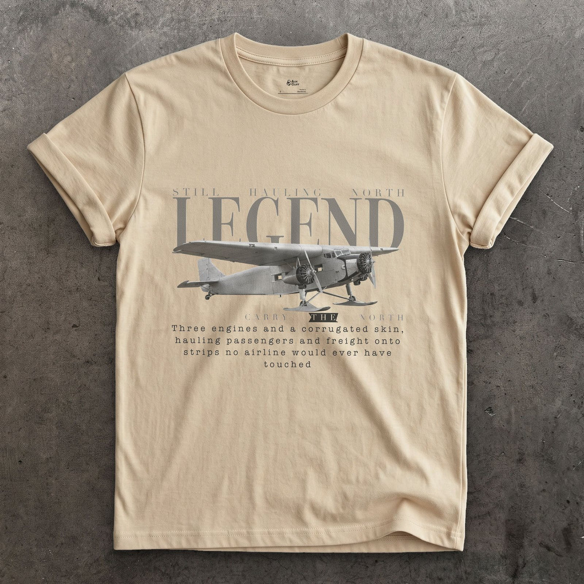 Ford Trimotor on Skis design on a Sand Gildan Softstyle t-shirt