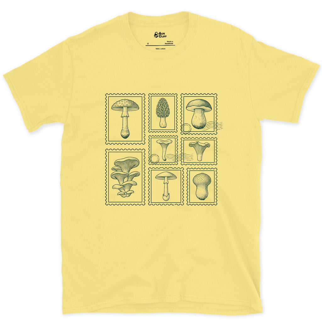 Four Mushrooms Foraged and Framed design on a Cornsilk Gildan Softstyle t-shirt