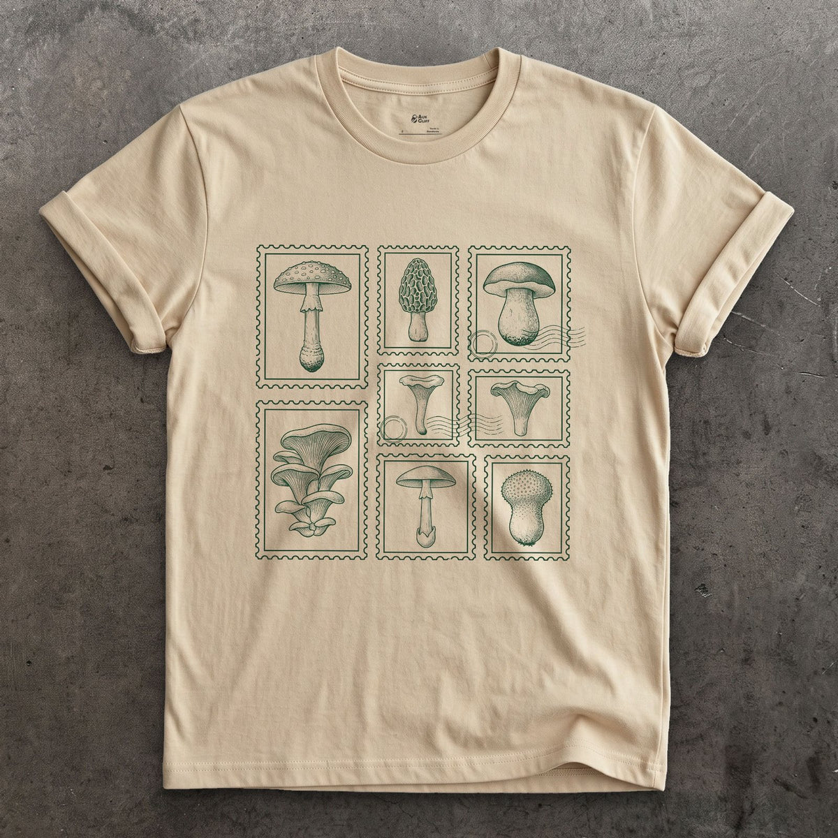 Four Mushrooms Foraged and Framed design on a Sand Gildan Softstyle t-shirt