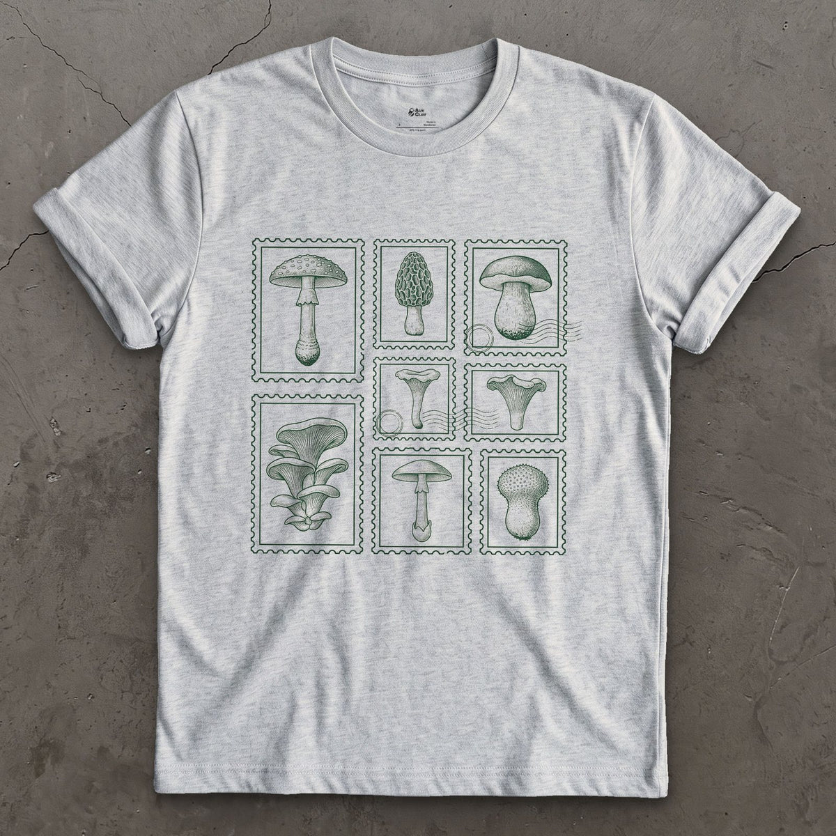 Four Mushrooms Foraged and Framed design on a Sport Grey Gildan Softstyle t-shirt