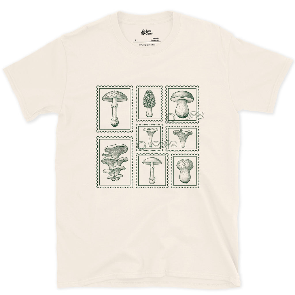 Four Mushrooms Foraged and Framed design on a Natural Gildan Softstyle t-shirt
