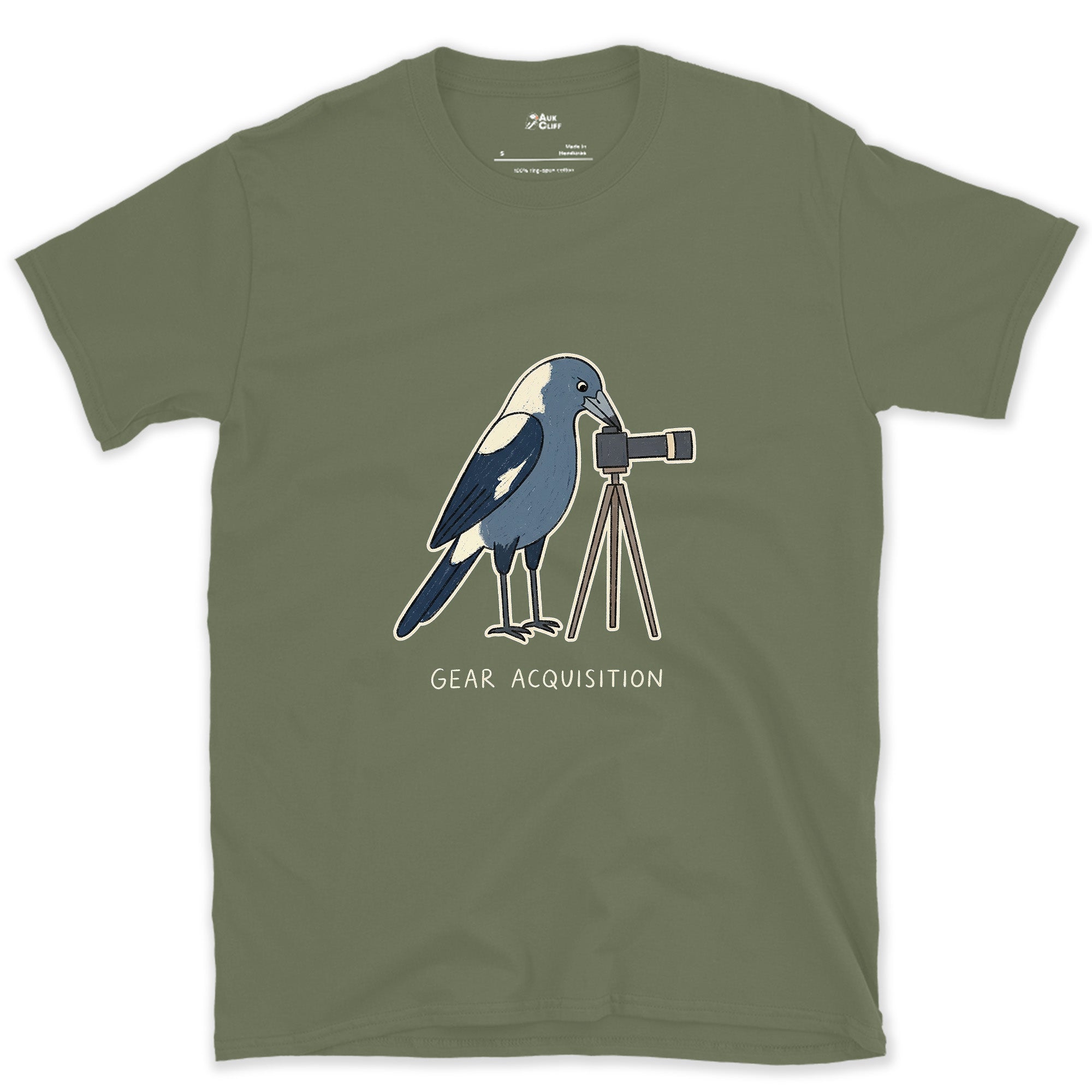 Gear Acquisition, Magpie With a Camera design on a Military Green Gildan Softstyle t-shirt