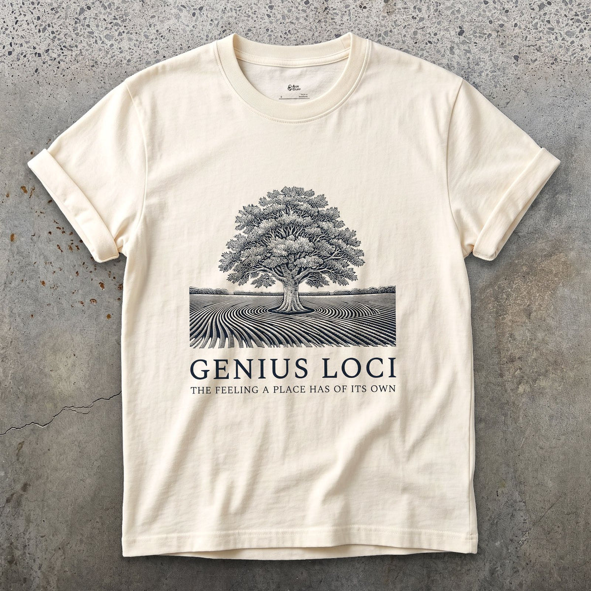 Genius Loci, the Feeling a Place Has of Its Own design on a Natural Gildan Softstyle t-shirt