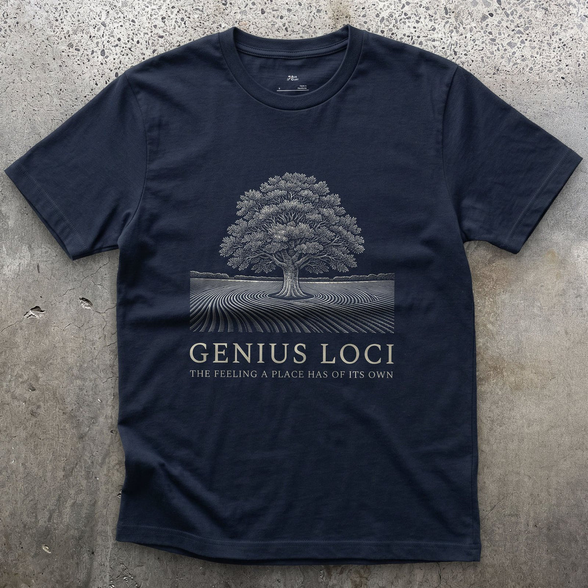 Genius Loci, the Feeling a Place Has of Its Own design on a Navy Gildan Softstyle t-shirt