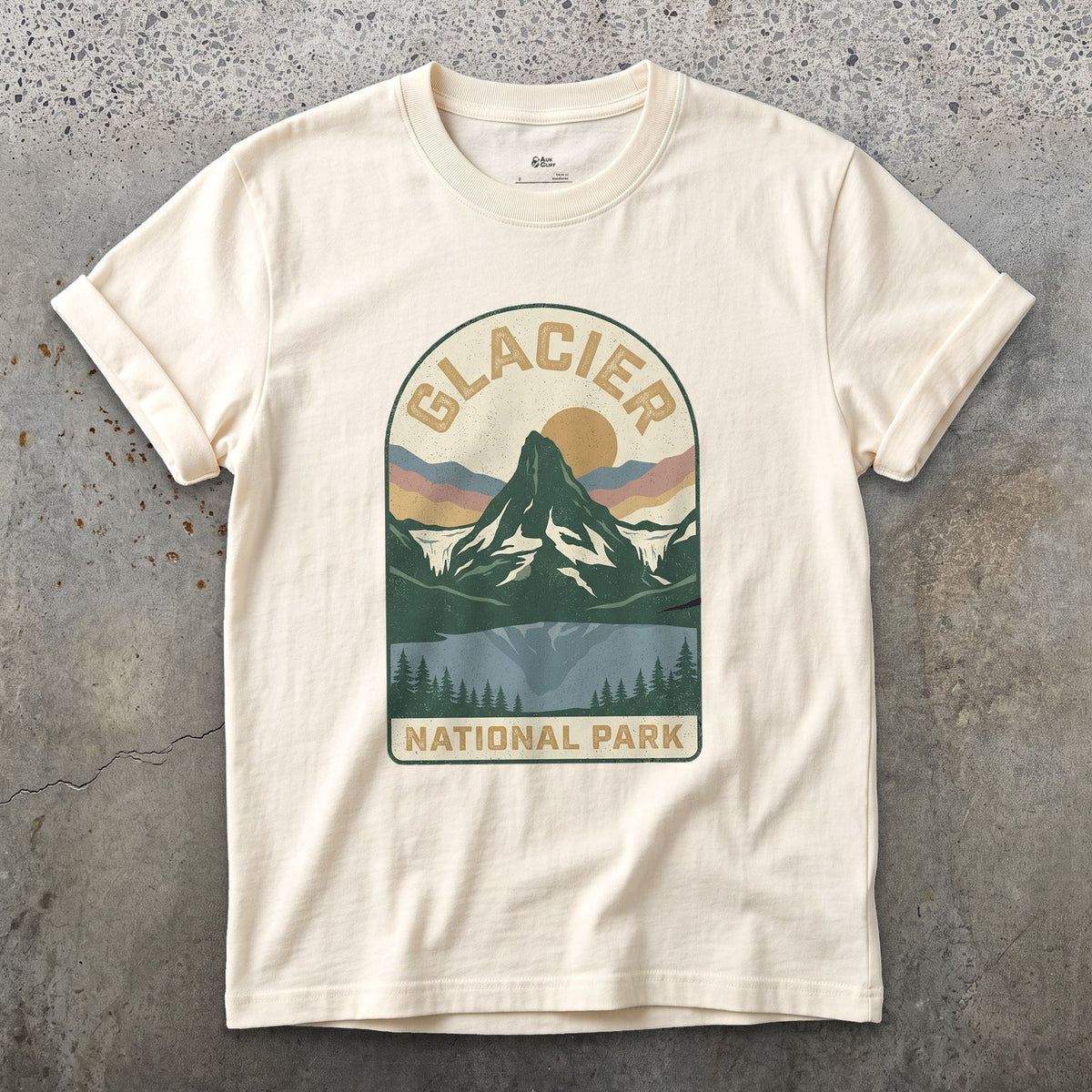 Glacier National Park Badge design on a Natural Gildan Softstyle t-shirt