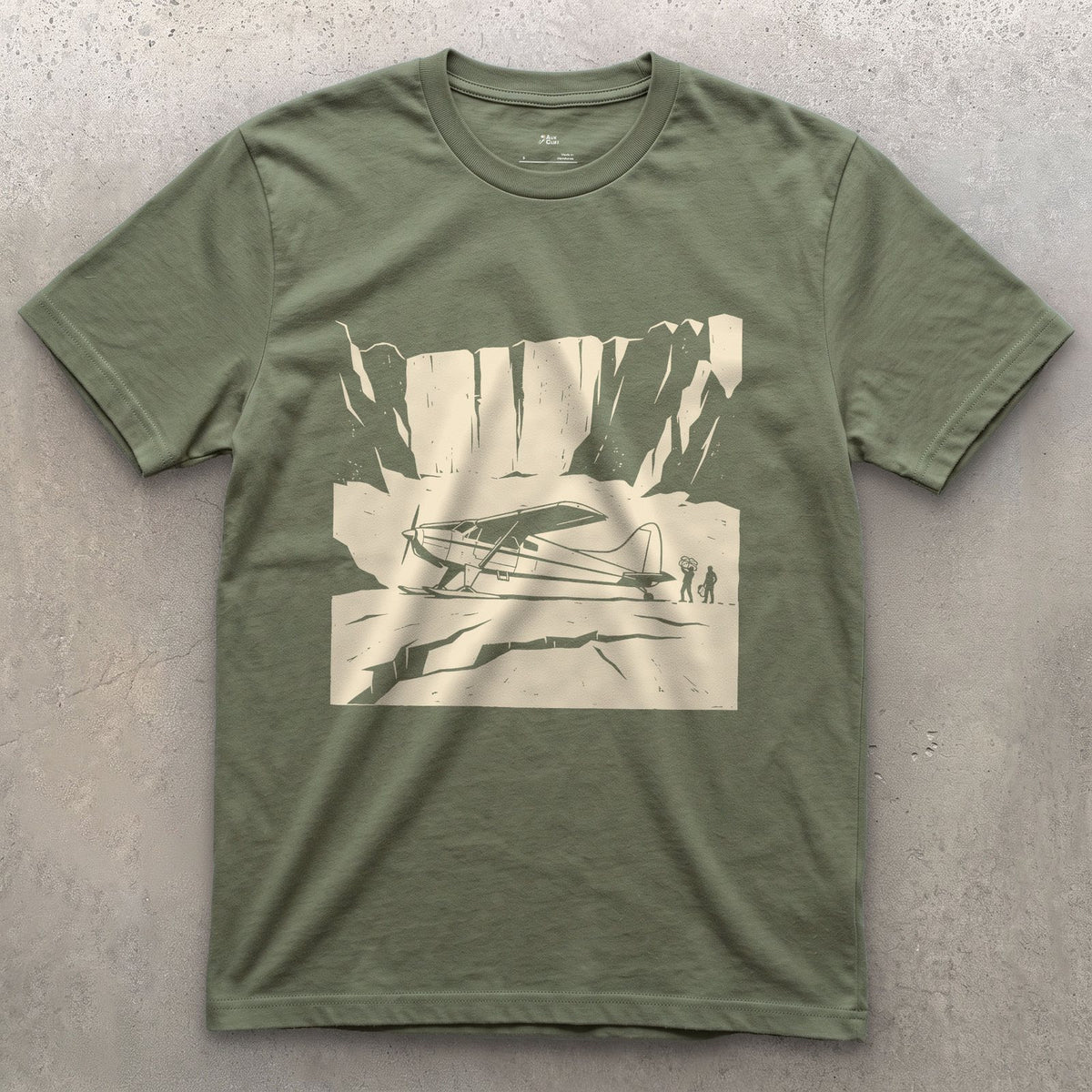 Landed on the Glacier With Skis Instead of Wheels design on a Military Green Gildan Softstyle t-shirt