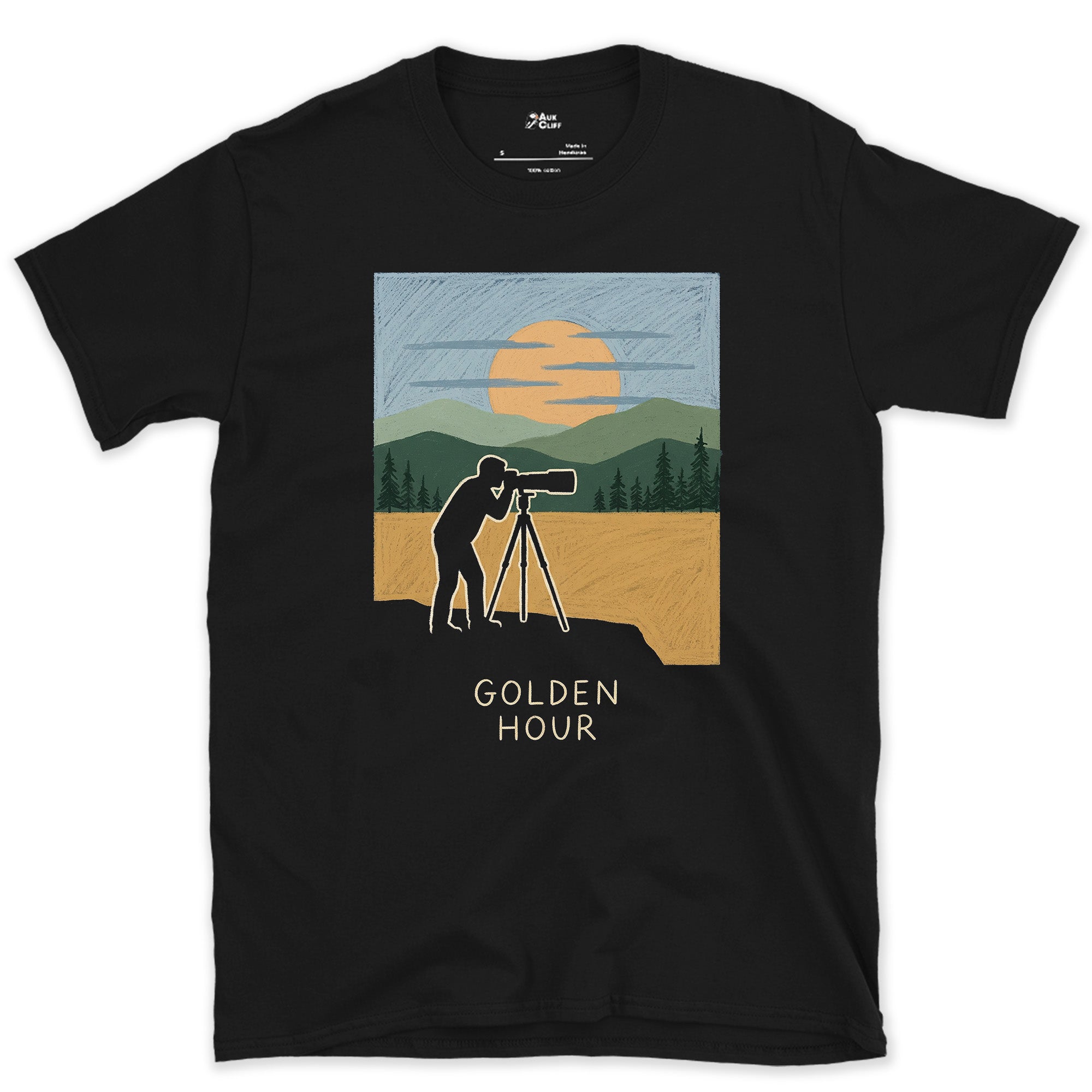 Postcard Perfect, Tripod on the Cliff Edge design on a Black Gildan Softstyle t-shirt