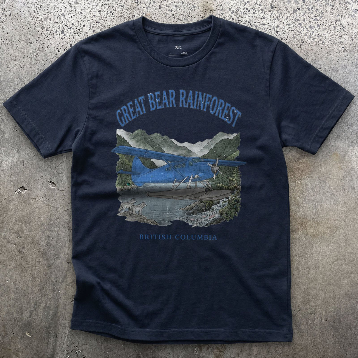 Great Bear Rainforest Bush Plane design on a Navy Gildan Softstyle t-shirt