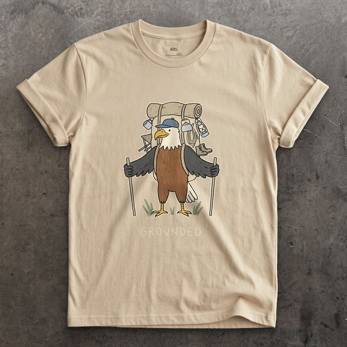 Too Heavy to Fly, Bald Eagle Hiker design on a Sand Gildan Softstyle t-shirt