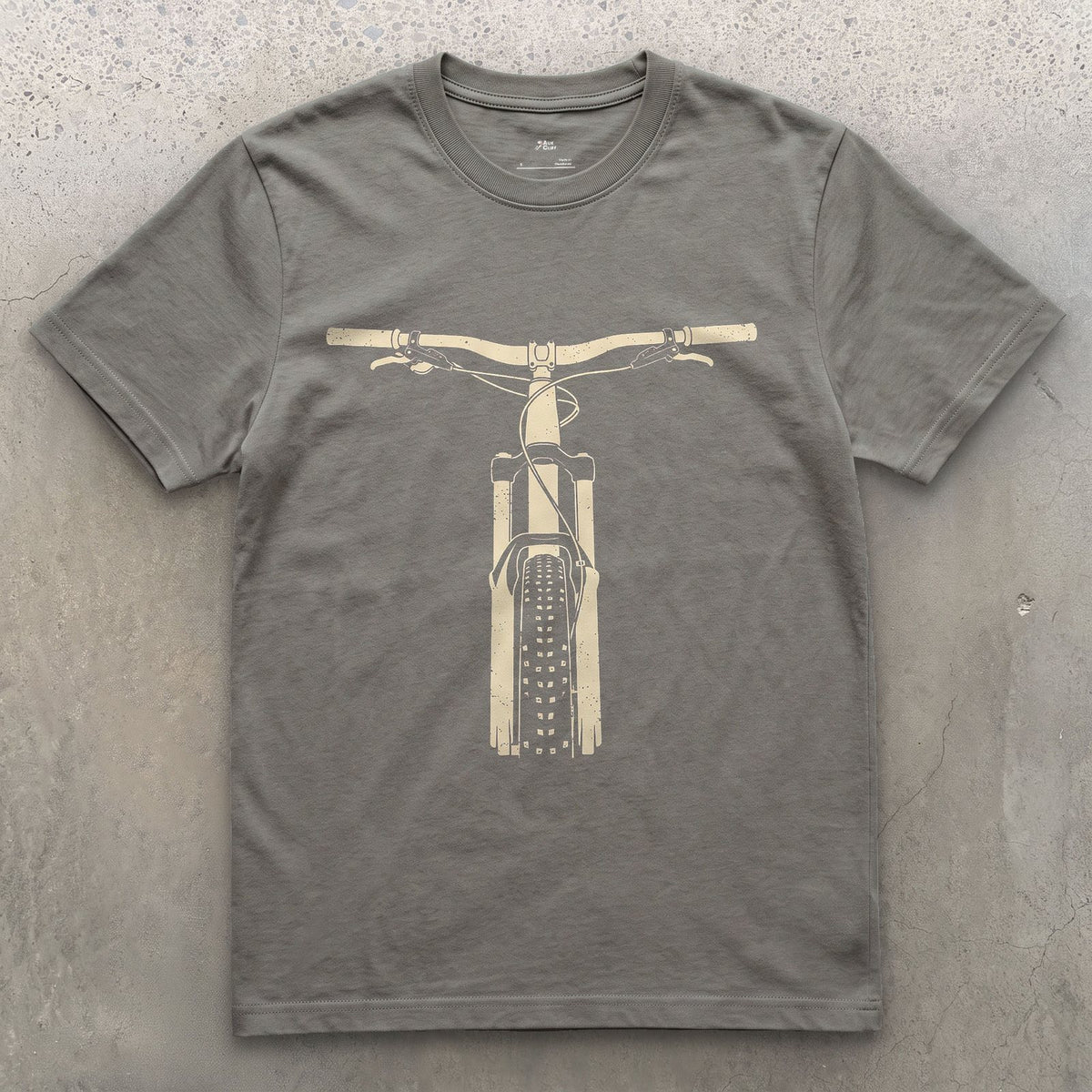 The Trail Dropping Away in Front of You design on a Charcoal Gildan Softstyle t-shirt