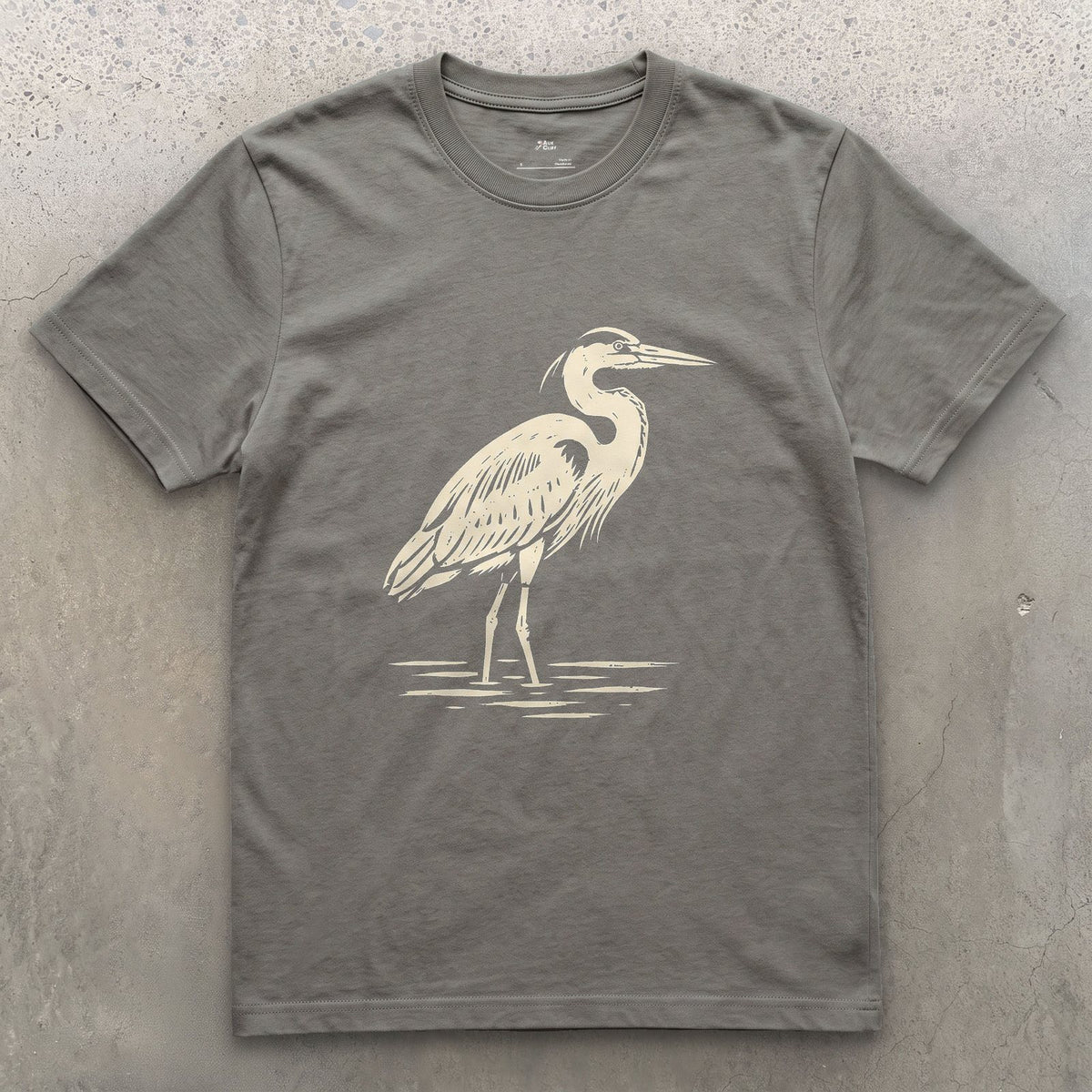 Waiting Longer Than You Will, Heron design on a Charcoal Gildan Softstyle t-shirt