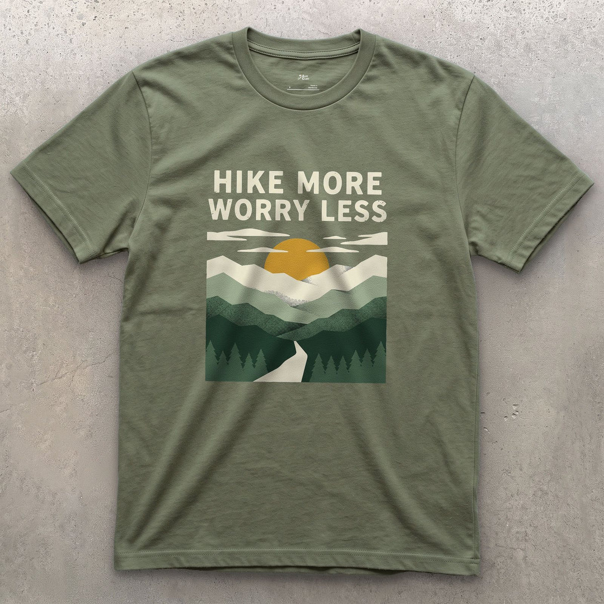Hike More, Worry Less, Sunrise Trail design on a Military Green Gildan Softstyle t-shirt