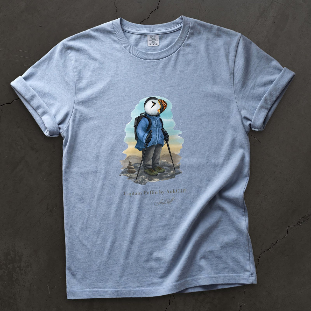 Captain Puffin Summit Hiker on a Washed Denim Comfort Colors t-shirt