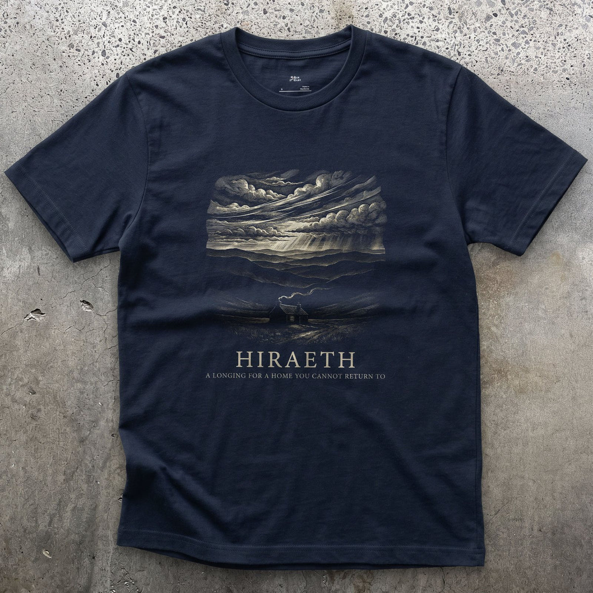 Hiraeth, a Longing for a Home You Cannot Return to design on a Navy Gildan Softstyle t-shirt