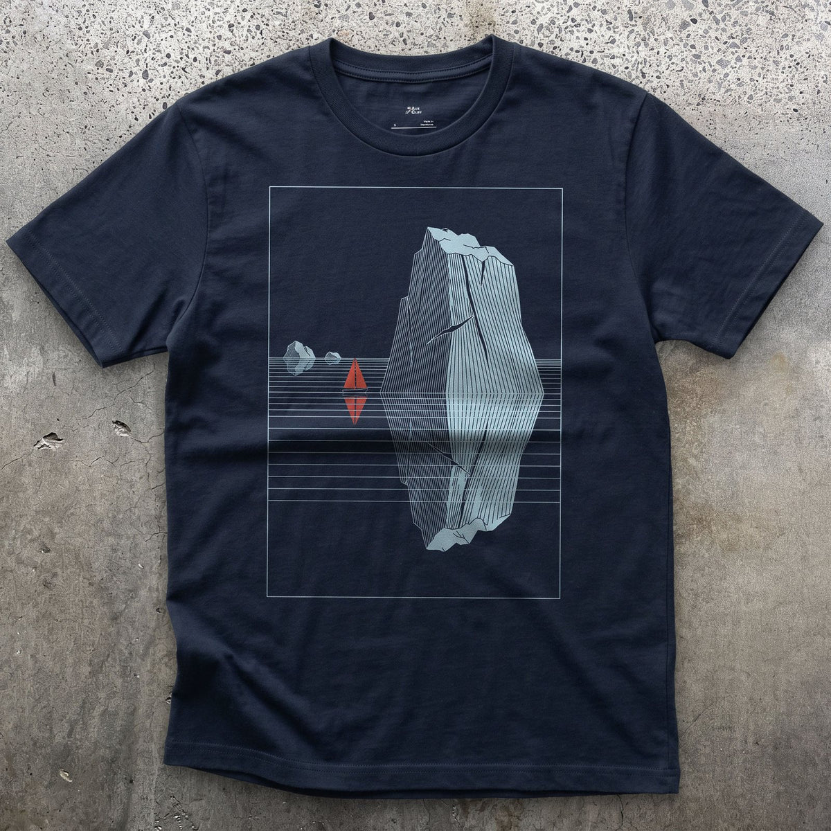 Small Boat, Glacier Iceberg Twice Its Size design on a Navy Gildan Softstyle t-shirt