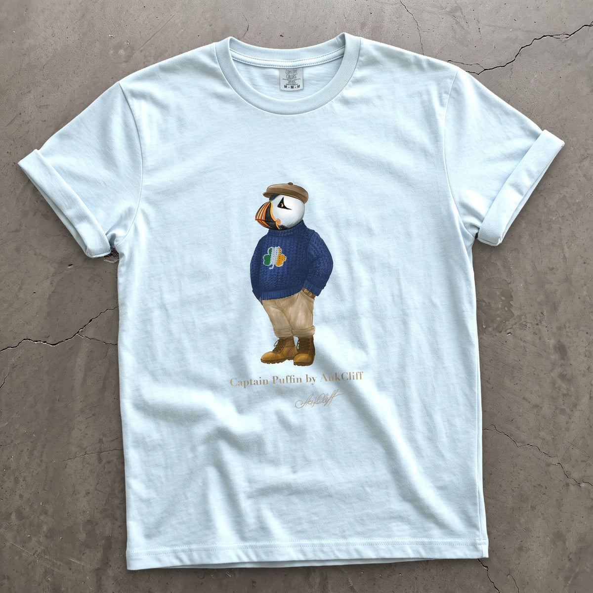 Captain Puffin Irish Trailkeeper on a Chambray Comfort Colors t-shirt