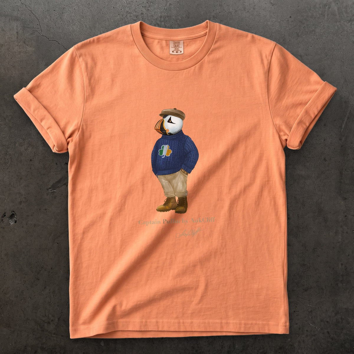 Captain Puffin Irish Trailkeeper on a Terracotta Comfort Colors t-shirt