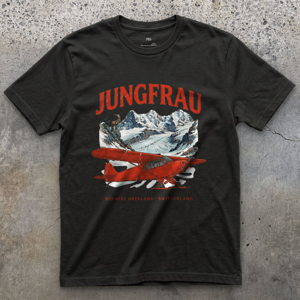 Jungfrau Bush Plane design on a Black Gildan Softstyle t-shirt