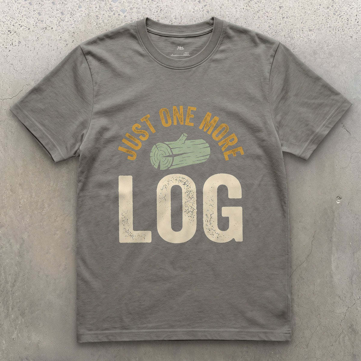 Just One More Log, Firewood Badge design on a Charcoal Gildan Softstyle t-shirt