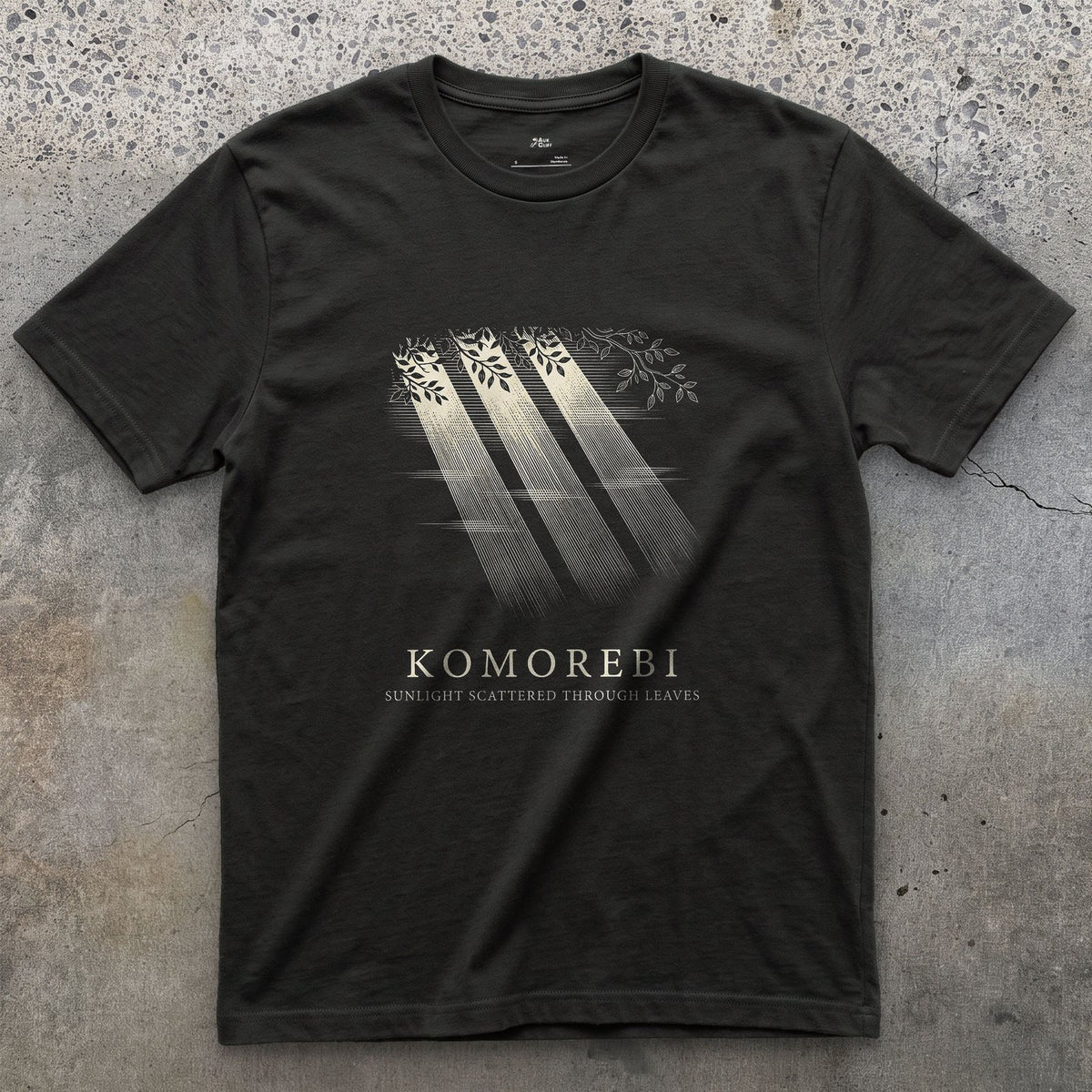 Komorebi, Sunlight Scattered Through Leaves design on a Black Gildan Softstyle t-shirt