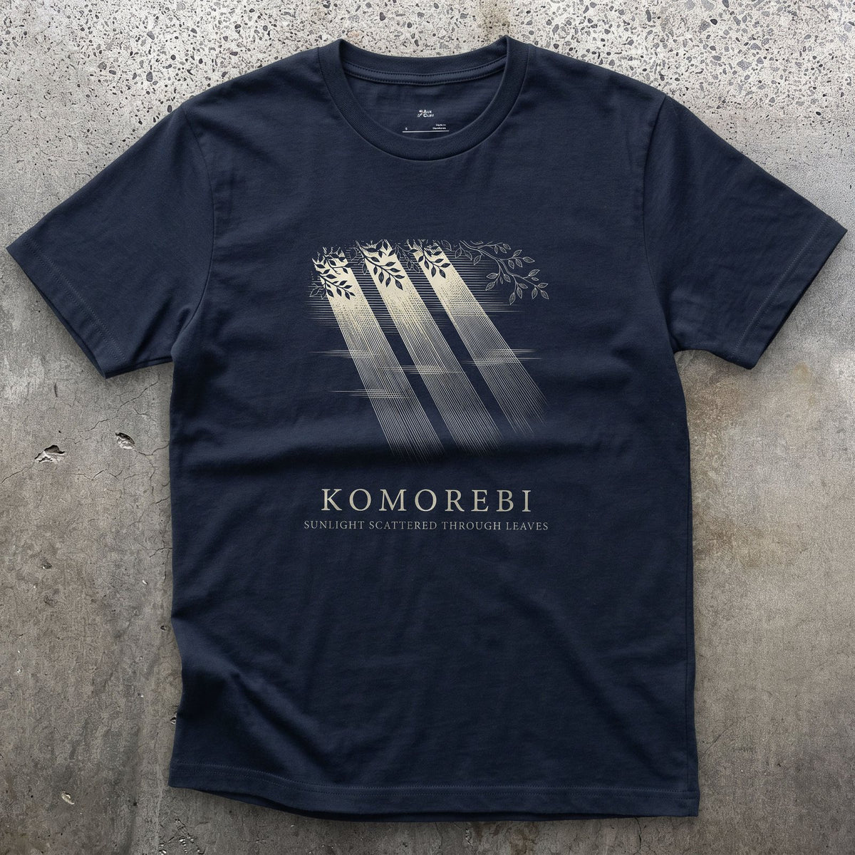 Komorebi, Sunlight Scattered Through Leaves design on a Navy Gildan Softstyle t-shirt