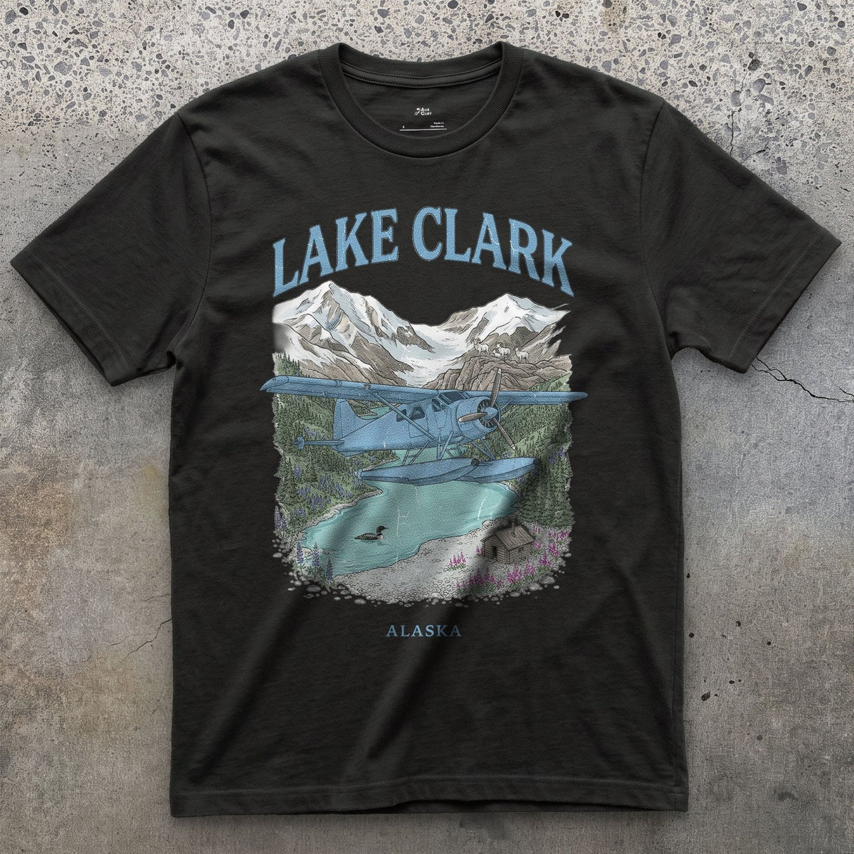 Lake Clark Bush Plane design on a Black Gildan Softstyle t-shirt