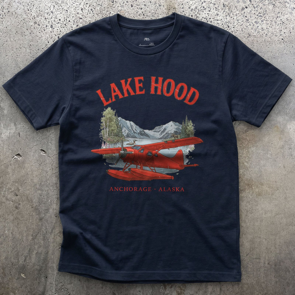 Lake Hood Bush Plane design on a Navy Gildan Softstyle t-shirt