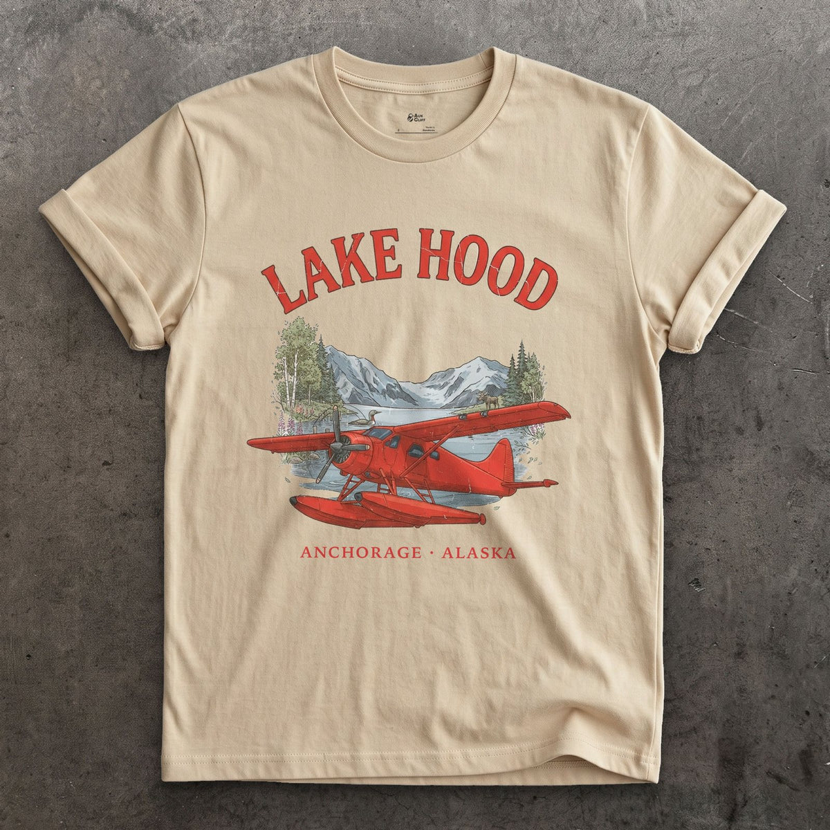 Lake Hood Bush Plane design on a Sand Gildan Softstyle t-shirt