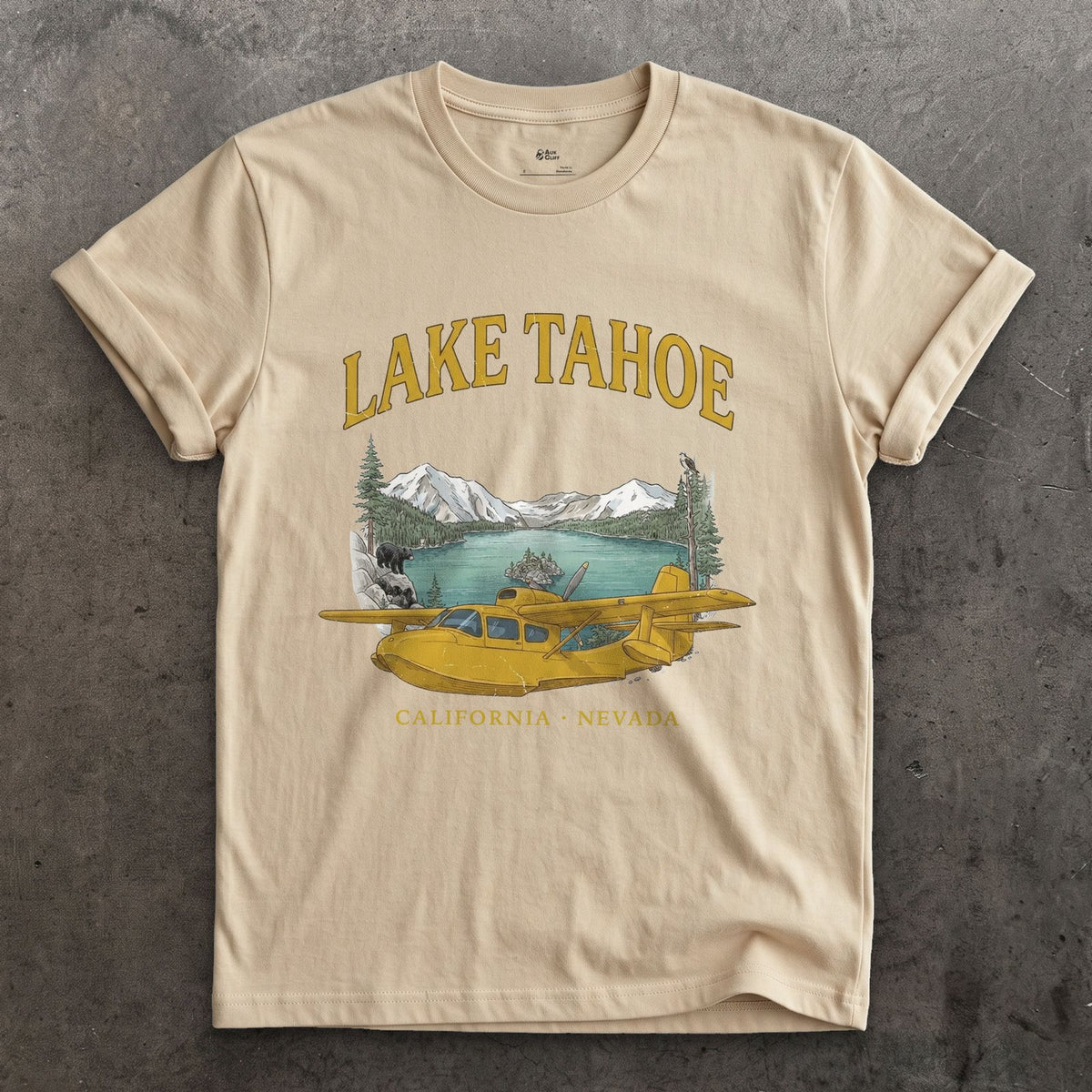 Lake Tahoe Bush Plane design on a Sand Gildan Softstyle t-shirt