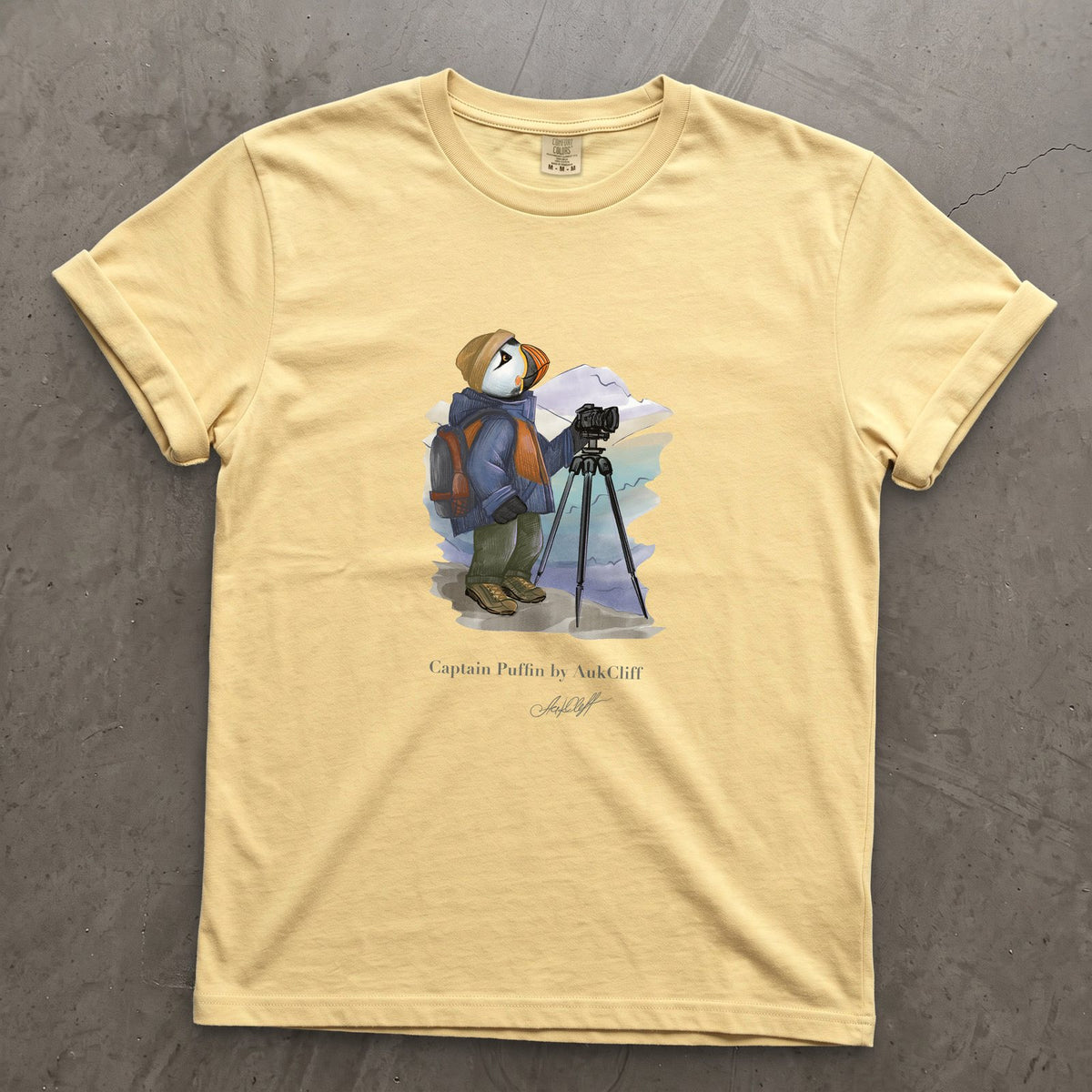 Captain Puffin Landscape Photographer on a Butter Comfort Colors t-shirt