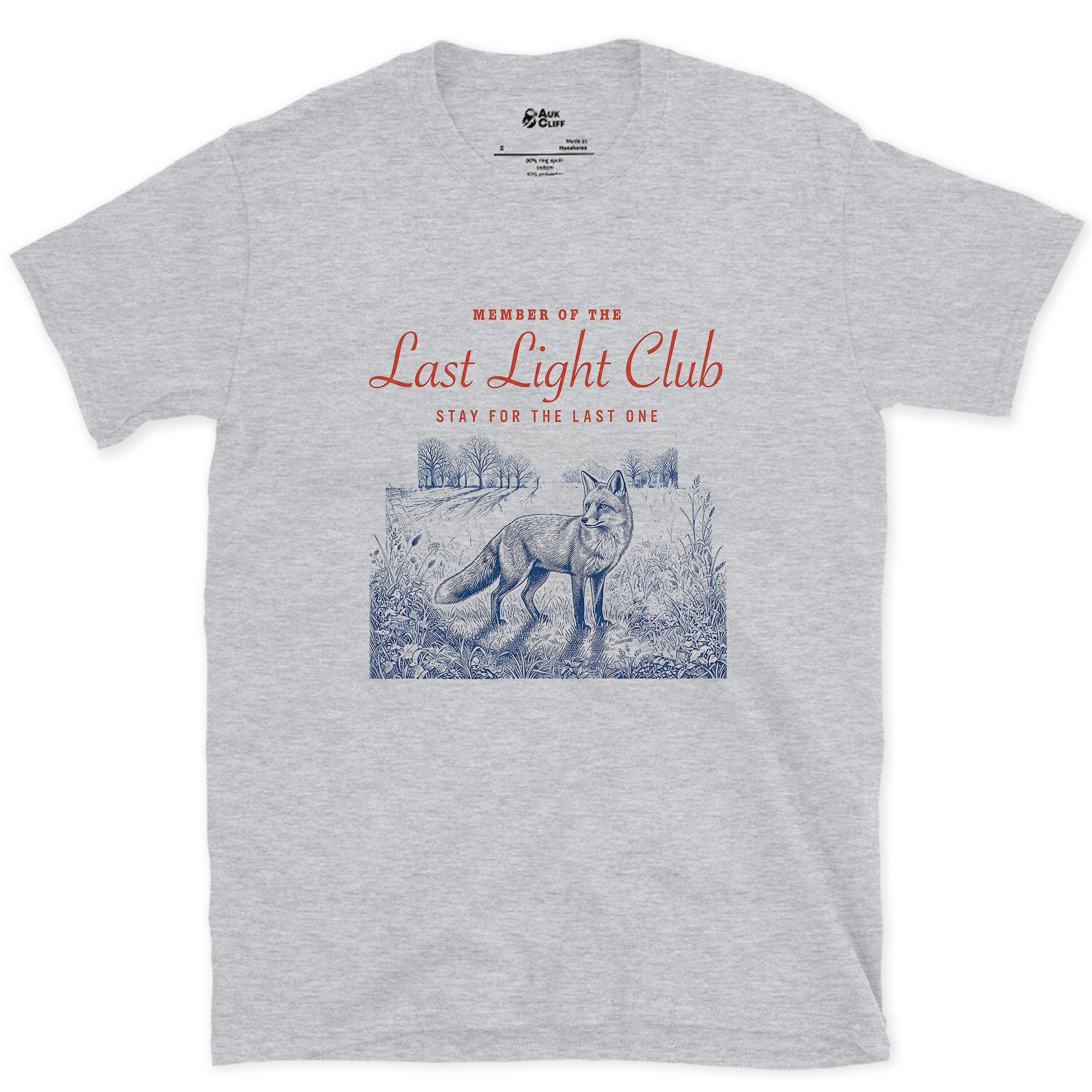 Last Light, Stay for the Last One, Coyote in Grass design on a Sport Grey Gildan Softstyle t-shirt