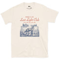 Last Light, Stay for the Last One, Coyote in Grass design on a Natural Gildan Softstyle t-shirt