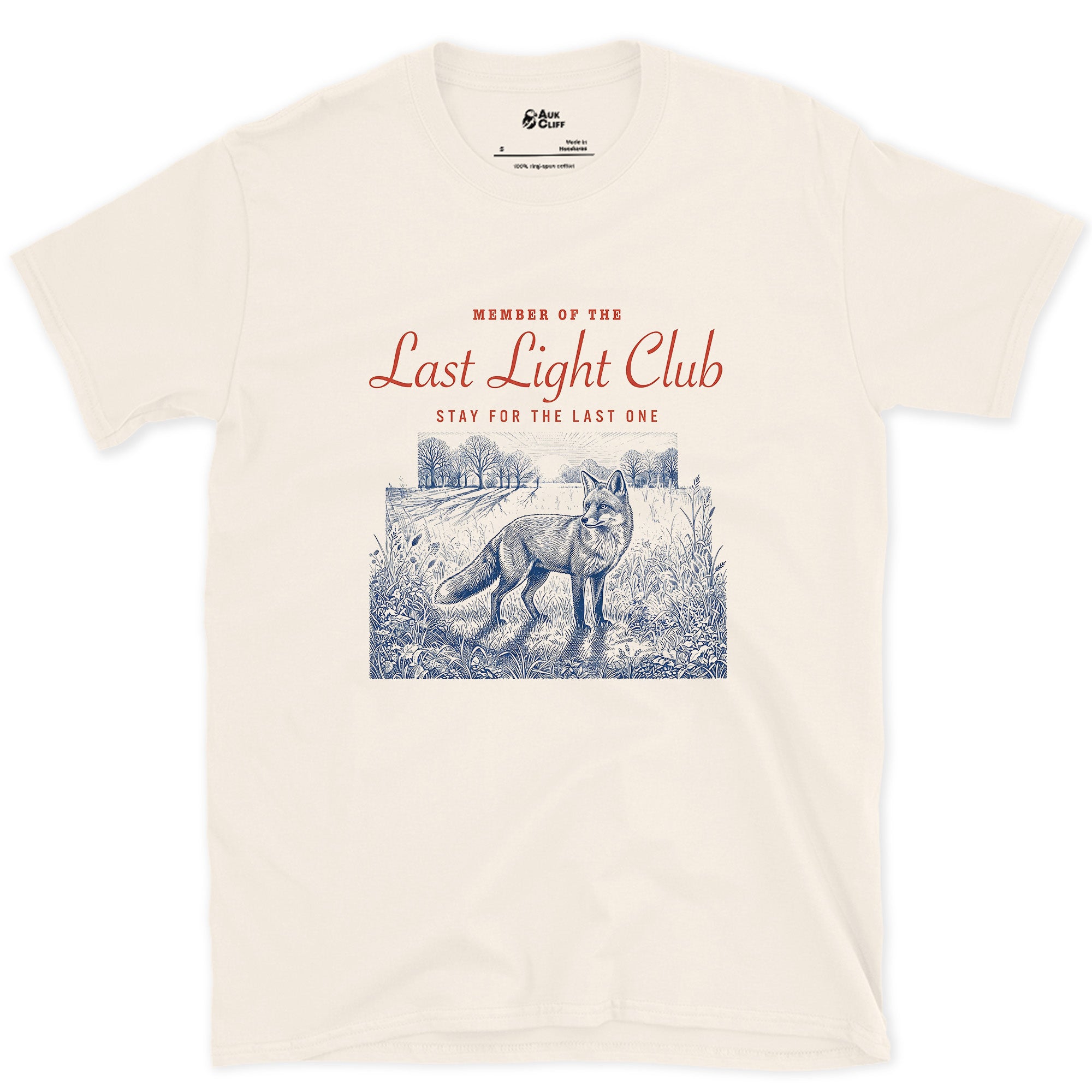 Last Light, Stay for the Last One, Coyote in Grass design on a Natural Gildan Softstyle t-shirt