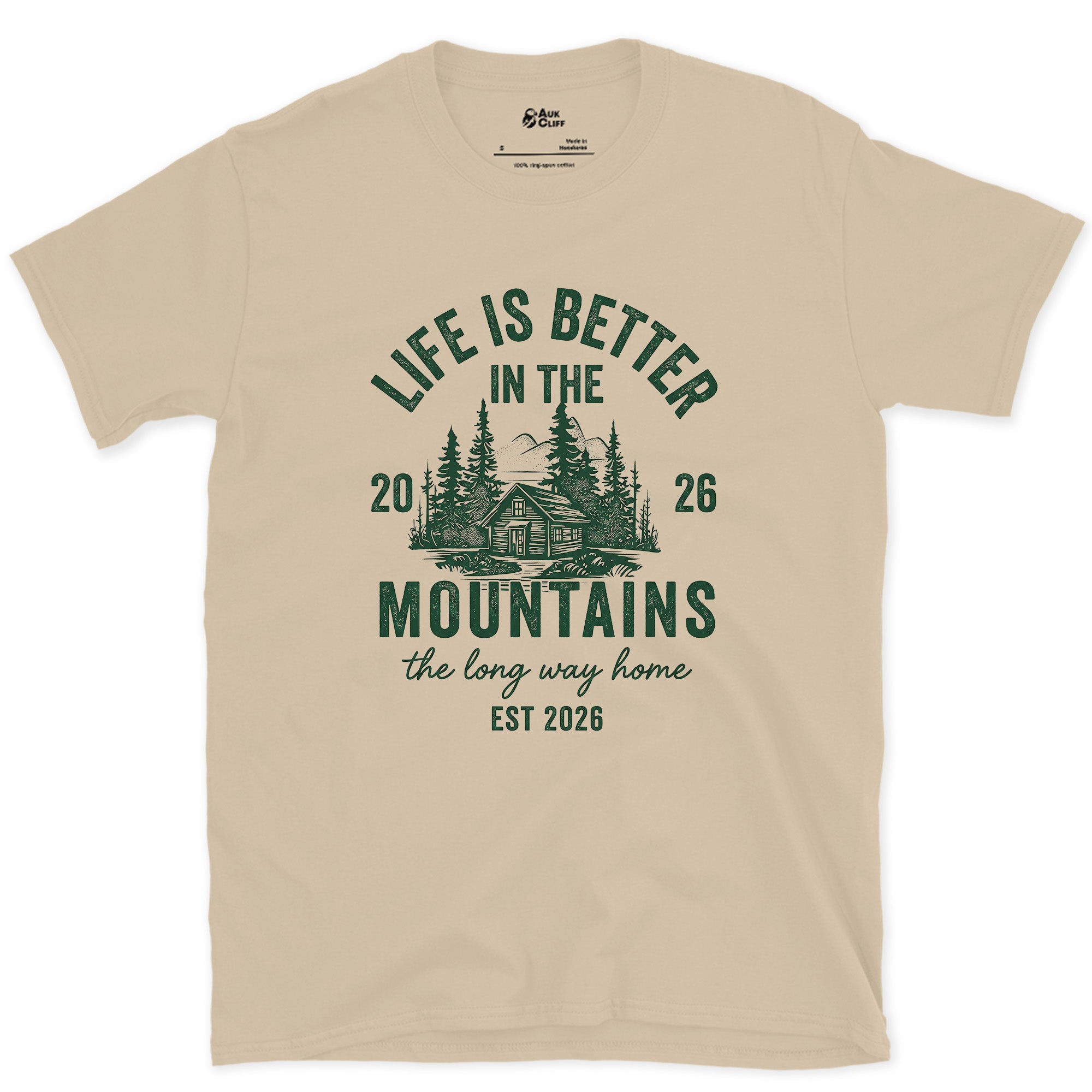 The Long Way Home, Cabin in the Pines design on a Sand Gildan Softstyle t-shirt