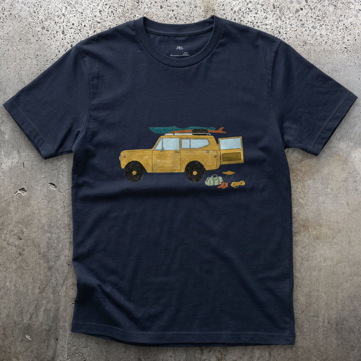 Wagon Loaded for a Put-In Before Sunrise design on a Navy Gildan Softstyle t-shirt