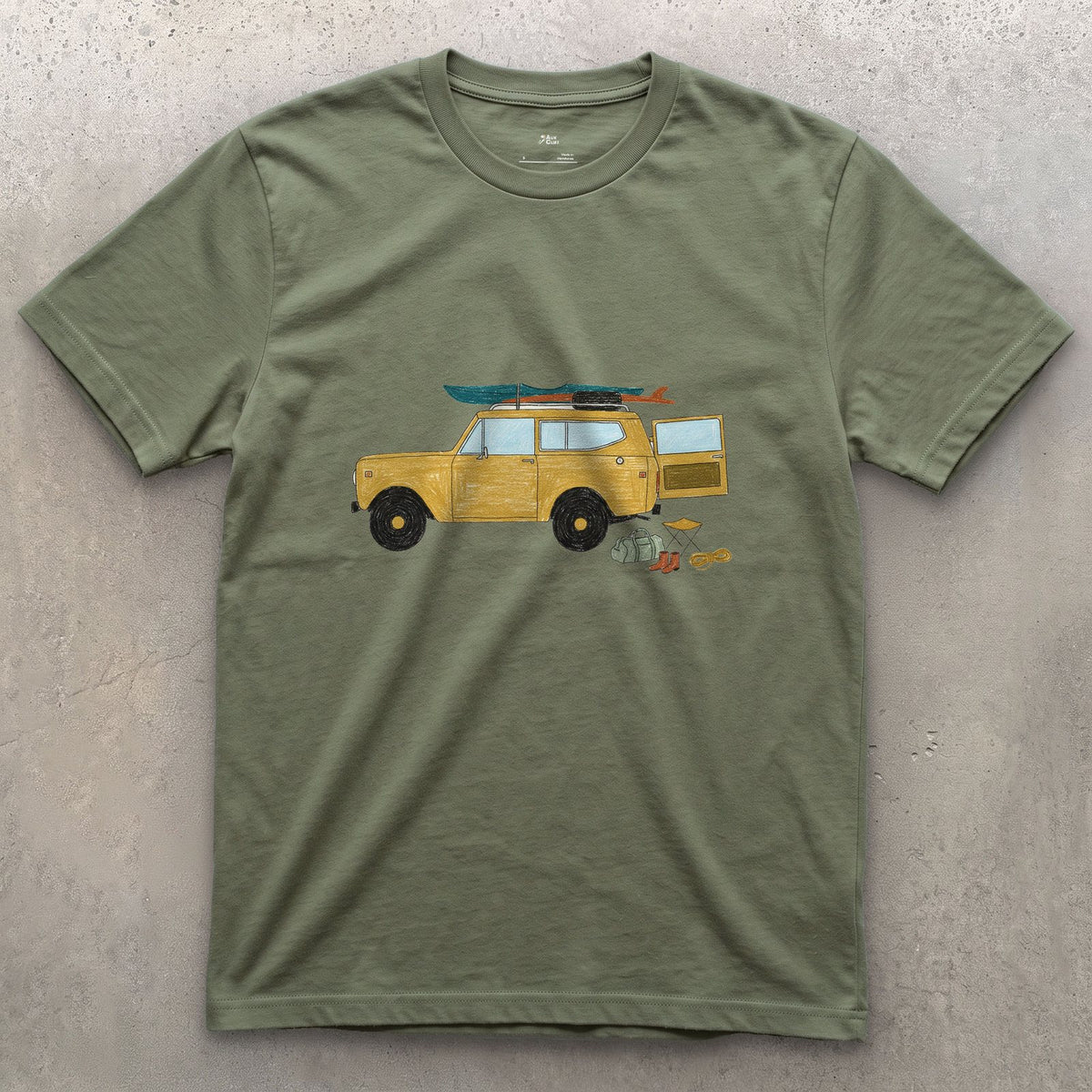 Wagon Loaded for a Put-In Before Sunrise design on a Military Green Gildan Softstyle t-shirt